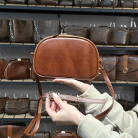 کیف چرم کمند قهوه ای ابر و بادی ساده