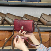 کیف چرم نگار زرشکی ابر و بادی ساده