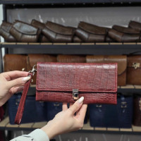 کیف چرم دستی رها آلبالویی ابر و بادی سنگی