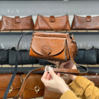 کیف چرم نورا قهوه ای گرم ابر و بادی سنگی