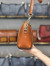 کیف چرم وانیا عسلی سنگی