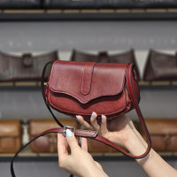 کیف چرم درب پروانه زرشکی آلبالویی ابر و بادی ساده