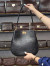 کیف چرم ساحل مشکی سنگی